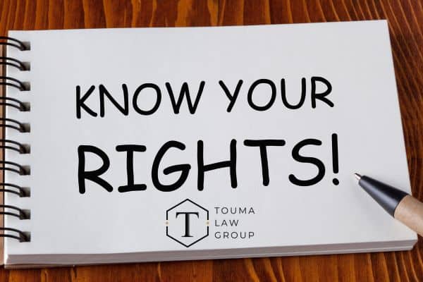 "Know your Rights" written in a notebook.